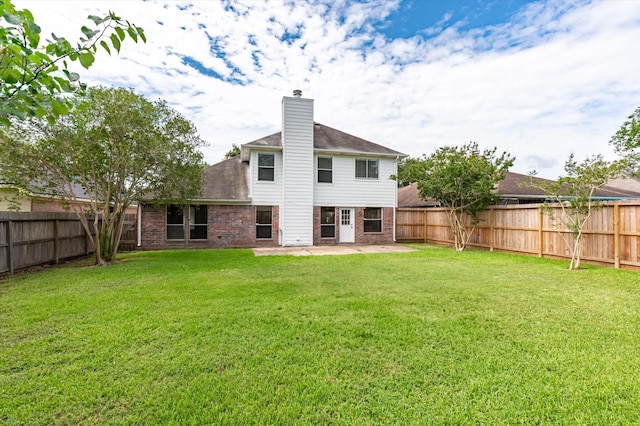 3118 Pheasant Trail Dr, Sugar Land, TX 77498 - rear view of property with a patio, a chimney, brick siding, and a shingled roof