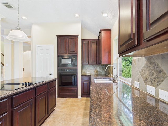 11628 King Edward Ct, Montgomery, TX 77316 - kitchen with black appliances, a sink, pendant lighting, decorative backsplash, and dark stone countertops