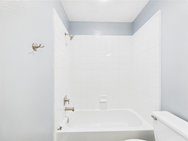 11628 King Edward Ct, Montgomery, TX 77316 - full bathroom with toilet, washtub / shower combination, and a textured ceiling