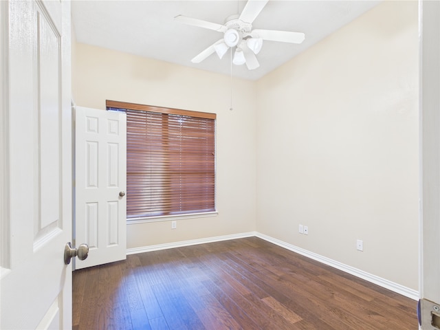 11628 King Edward Ct, Montgomery, TX 77316 - empty room featuring dark wood-style floors, a ceiling fan, and baseboards
