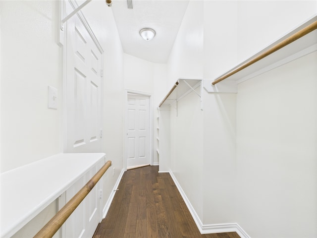 11628 King Edward Ct, Montgomery, TX 77316 - walk in closet featuring dark wood-style flooring
