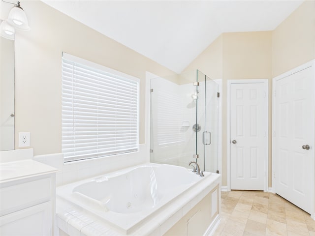 11628 King Edward Ct, Montgomery, TX 77316 - full bathroom featuring a shower stall, a jetted tub, vanity, and lofted ceiling