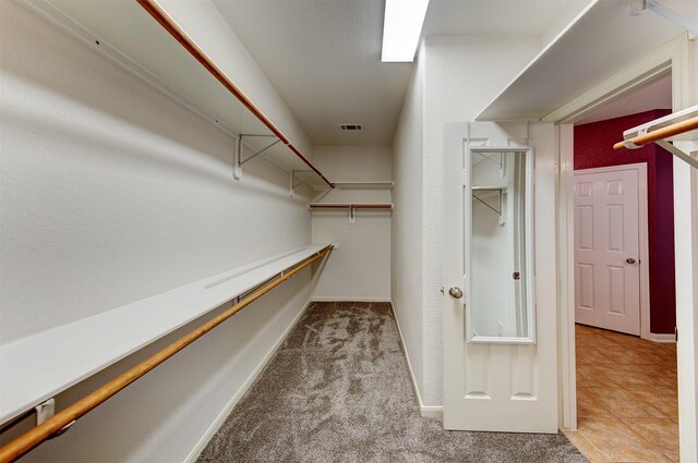 1810 Spreading Bough Ln, Richmond, TX 77406 - walk in closet featuring carpet floors