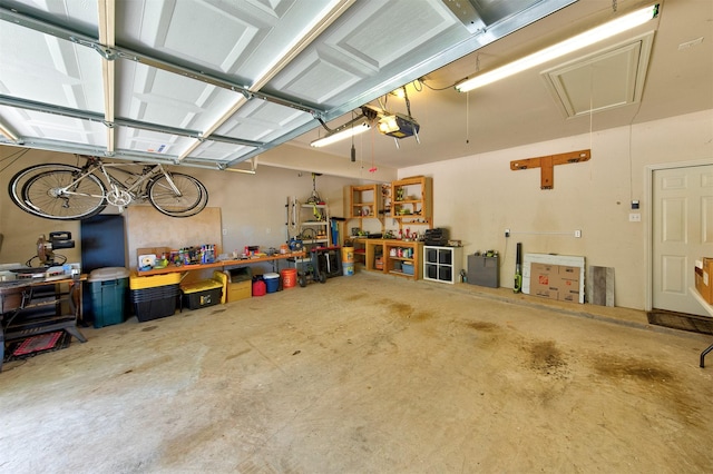 1810 Spreading Bough Ln, Richmond, TX 77406 - garage featuring a workshop area and a garage door opener