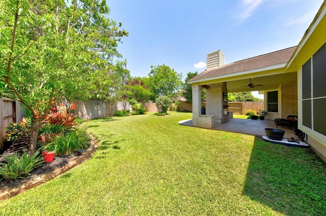 1810 Spreading Bough Ln, Richmond, TX 77406 - view of yard with ceiling fan and a patio