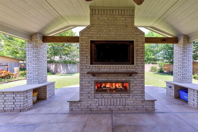 1810 Spreading Bough Ln, Richmond, TX 77406 - view of patio with an outdoor brick fireplace