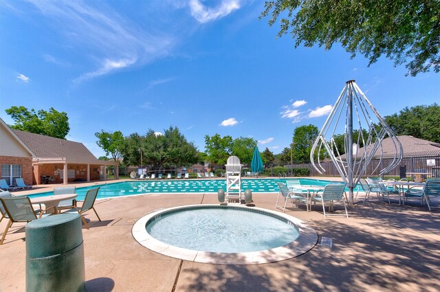 1810 Spreading Bough Ln, Richmond, TX 77406 - community pool with a patio