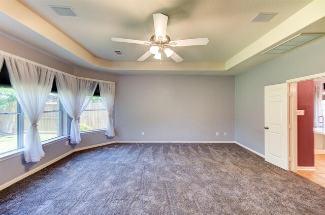 1810 Spreading Bough Ln, Richmond, TX 77406 - unfurnished room featuring carpet, a raised ceiling, ceiling fan, and baseboards