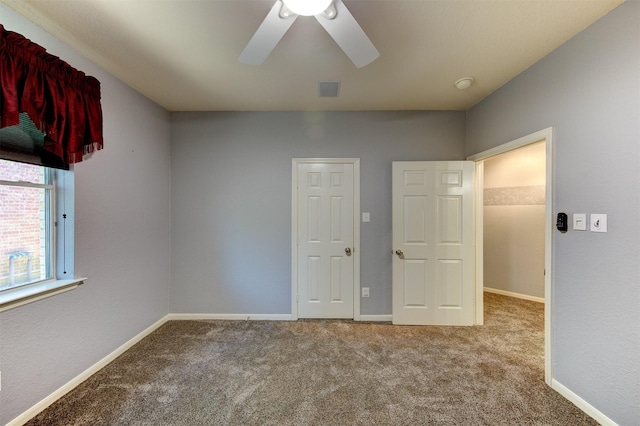 1810 Spreading Bough Ln, Richmond, TX 77406 - unfurnished bedroom with carpet, baseboards, and a ceiling fan