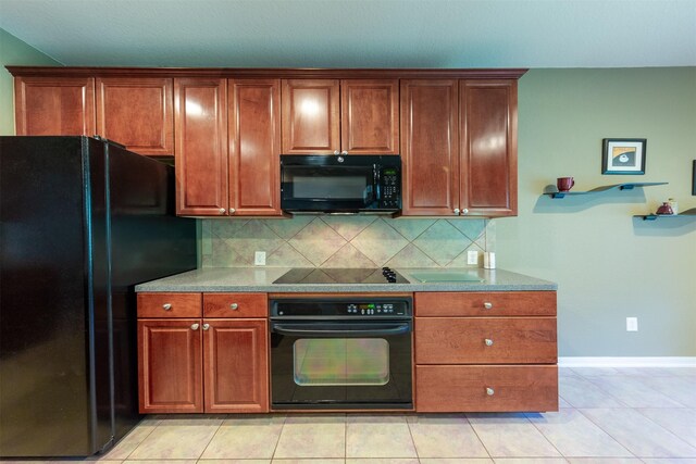 1810 Spreading Bough Ln, Richmond, TX 77406 - kitchen with black appliances, tasteful backsplash, baseboards, light tile patterned floors, and brown cabinets