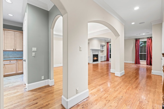6230 Elm Heights Ln, Houston, TX 77081 - hall with ornamental molding, light wood-style floors, baseboards, and recessed lighting