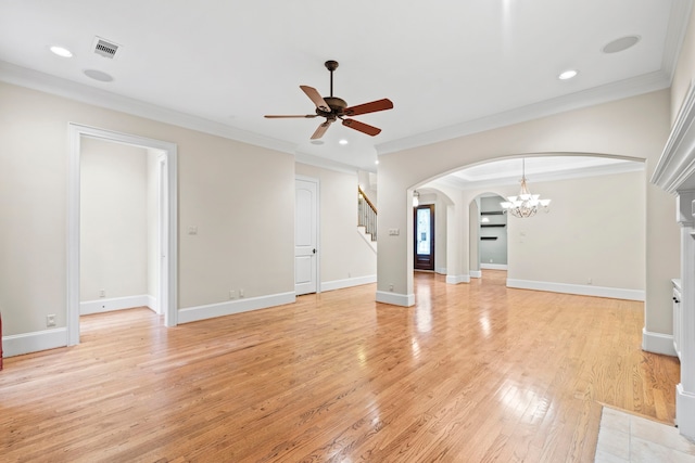 6230 Elm Heights Ln, Houston, TX 77081 - unfurnished living room with arched walkways, a ceiling fan, stairway, a chandelier, and light wood-type flooring