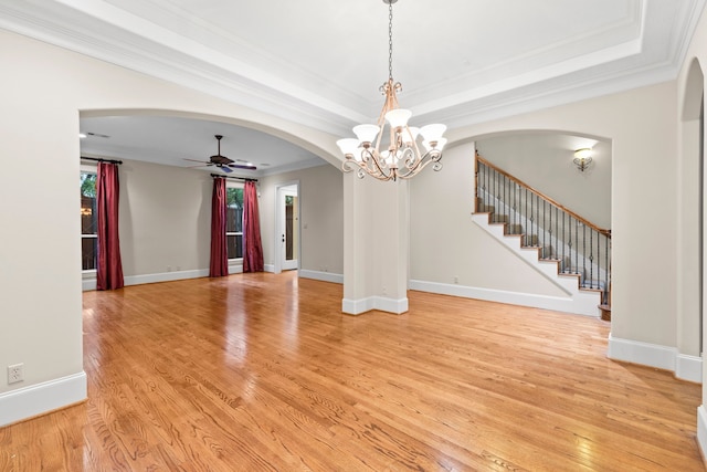 6230 Elm Heights Ln, Houston, TX 77081 - unfurnished room featuring arched walkways, ceiling fan, ornamental molding, a chandelier, and light wood finished floors