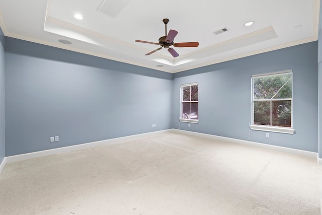 6230 Elm Heights Ln, Houston, TX 77081 - carpeted spare room featuring a raised ceiling, ornamental molding, recessed lighting, baseboards, and ceiling fan