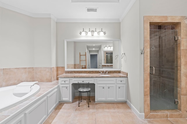 6230 Elm Heights Ln, Houston, TX 77081 - full bath with a stall shower, crown molding, tile patterned floors, vanity, and a tub