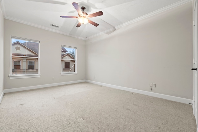 6230 Elm Heights Ln, Houston, TX 77081 - empty room with ornamental molding, a ceiling fan, light colored carpet, and baseboards