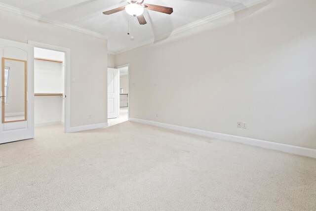 6230 Elm Heights Ln, Houston, TX 77081 - unfurnished bedroom featuring ornamental molding, light carpet, baseboards, a spacious closet, and a closet