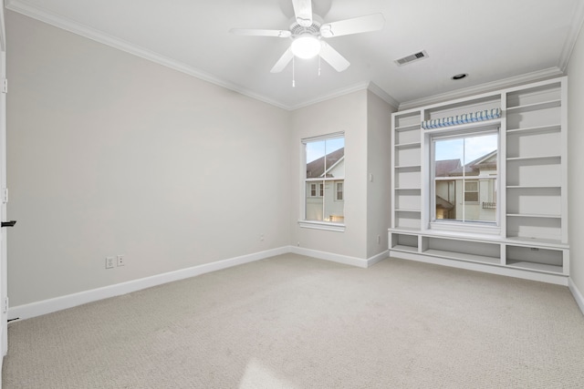 6230 Elm Heights Ln, Houston, TX 77081 - carpeted empty room featuring crown molding, baseboards, and a ceiling fan