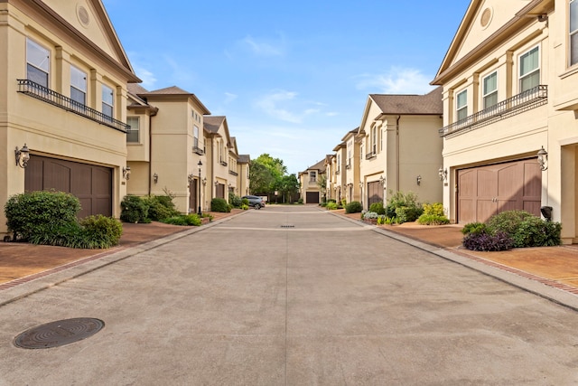 6230 Elm Heights Ln, Houston, TX 77081 - view of concrete street featuring a residential view and curbs