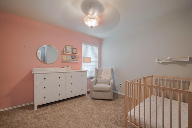4523 Stolz Trl, Katy, TX 77493 - carpeted bedroom with a crib, baseboards, and ceiling fan