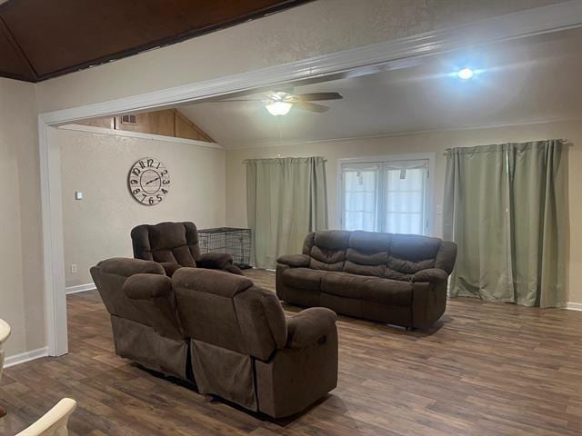 13375 Craig Ln, Bevil Oaks, TX 77713 - living room featuring dark wood finished floors, a ceiling fan, lofted ceiling, and baseboards