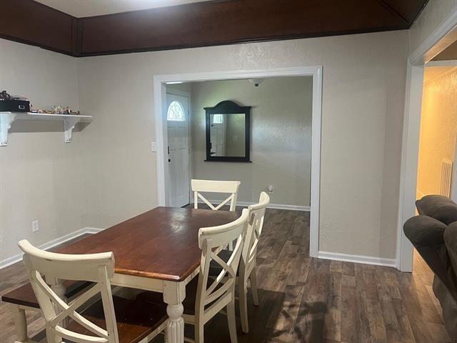 13375 Craig Ln, Bevil Oaks, TX 77713 - dining space featuring wood finished floors and baseboards