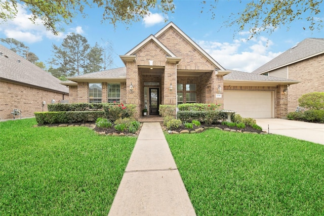 27259 Jessica Hills Ln, Spring, TX 77386 - view of front of house featuring brick siding, a garage, a front lawn, and concrete driveway