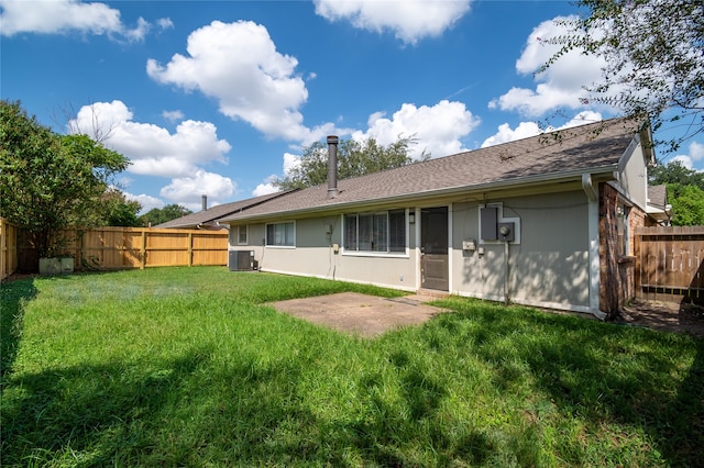19411 Southaven Dr, Houston, TX 77084 - back of house featuring central AC, stucco siding, and a shingled roof