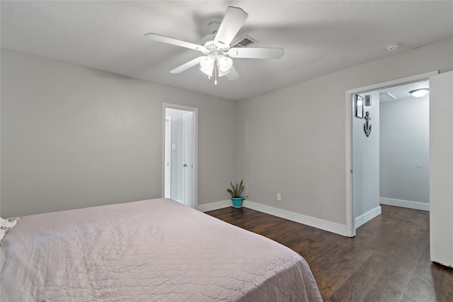 19411 Southaven Dr, Houston, TX 77084 - bedroom featuring dark wood finished floors, baseboards, and a ceiling fan