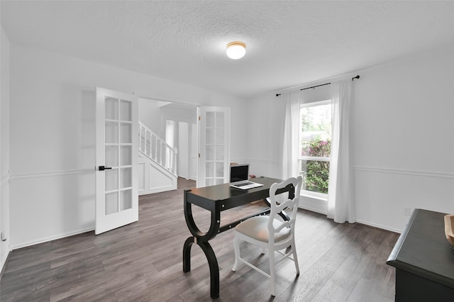 16419 Fox Crossing Ln, Spring, TX 77379 - home office with french doors, wood finished floors, a textured ceiling, and baseboards