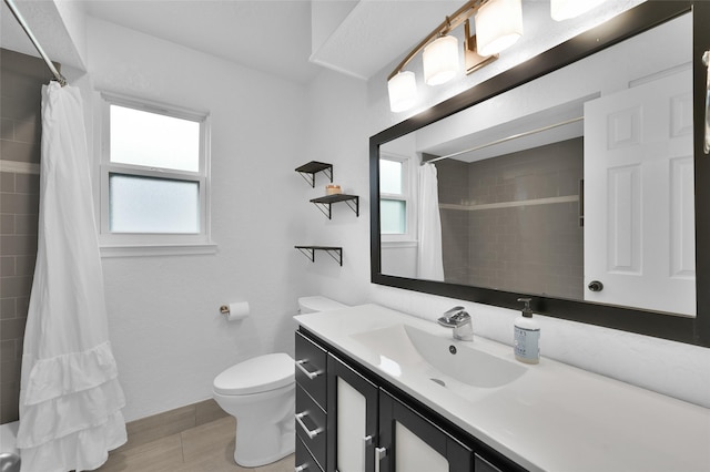 16419 Fox Crossing Ln, Spring, TX 77379 - bathroom with healthy amount of natural light, toilet, vanity, and a shower with curtain
