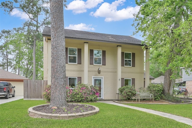 16419 Fox Crossing Ln, Spring, TX 77379 - greek revival house with a garage and brick siding