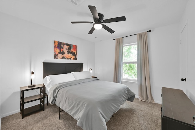 16419 Fox Crossing Ln, Spring, TX 77379 - bedroom with light carpet, baseboards, and ceiling fan