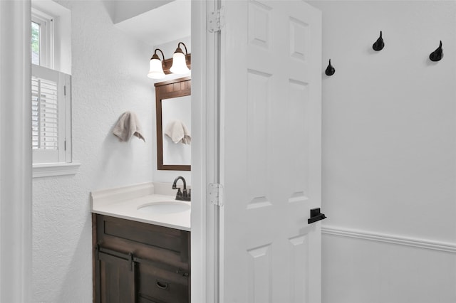 16419 Fox Crossing Ln, Spring, TX 77379 - bathroom featuring vanity and a textured wall