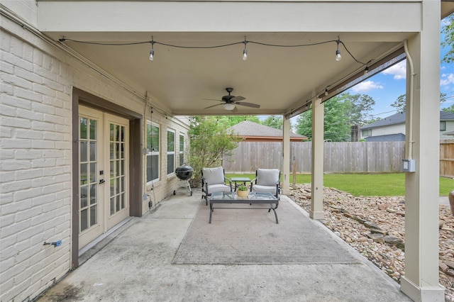 16419 Fox Crossing Ln, Spring, TX 77379 - view of patio featuring french doors, a fenced backyard, and a ceiling fan