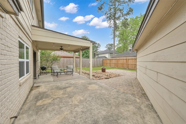 16419 Fox Crossing Ln, Spring, TX 77379 - view of patio with a fenced backyard and a ceiling fan
