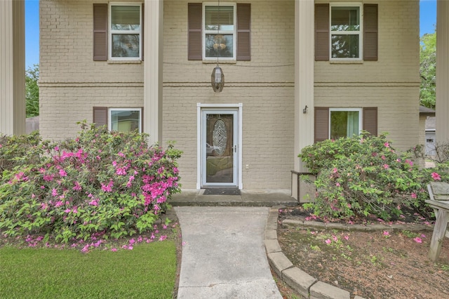 16419 Fox Crossing Ln, Spring, TX 77379 - doorway to property featuring brick siding and a porch