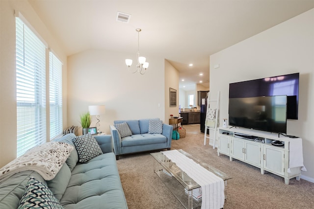 14657 E Pine Heart Dr, Conroe, TX 77302 - living area featuring a chandelier, light carpet, and vaulted ceiling
