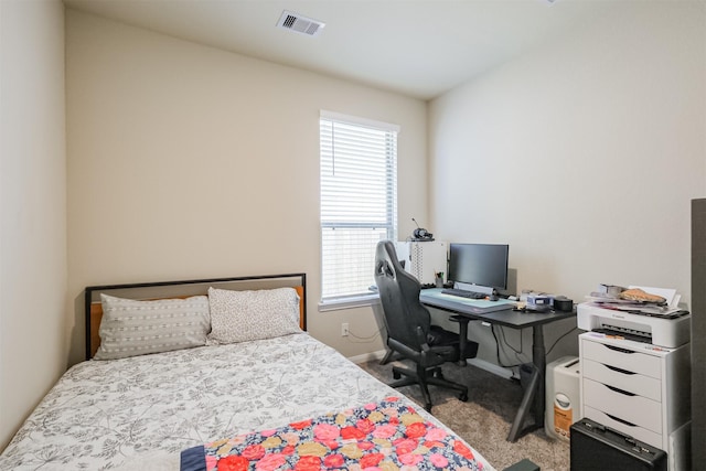 14657 E Pine Heart Dr, Conroe, TX 77302 - carpeted bedroom with baseboards and a desk