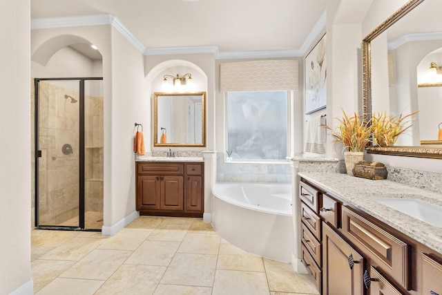 2322 Dolan Springs Ln, Friendswood, TX 77546 - full bathroom with a shower stall, ornamental molding, a bath, two vanities, and tile patterned floors