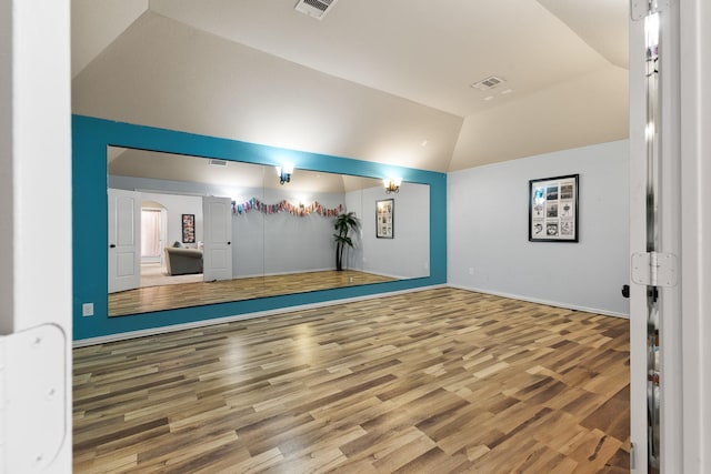 2322 Dolan Springs Ln, Friendswood, TX 77546 - unfurnished room featuring wood finished floors, baseboards, and high vaulted ceiling