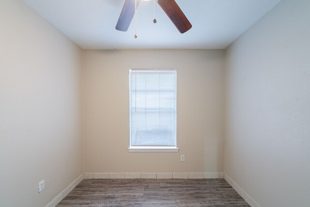 751 Terryhollow St, Channelview, TX 77530 - spare room with ceiling fan, healthy amount of natural light, and wood finished floors