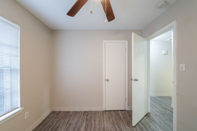 751 Terryhollow St, Channelview, TX 77530 - unfurnished room with a ceiling fan, wood finished floors, and a smoke detector