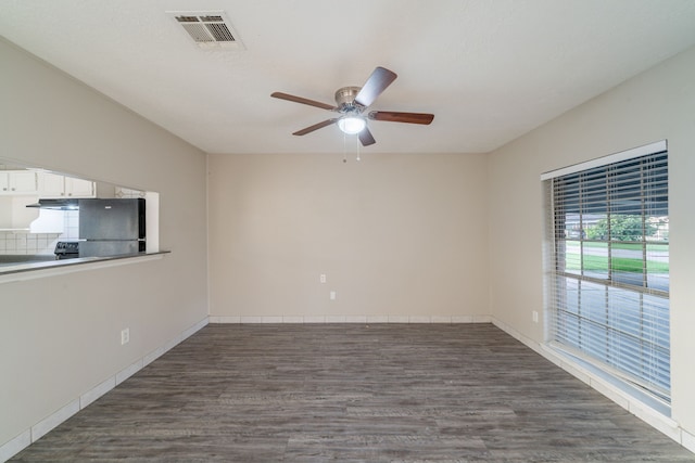 751 Terryhollow St, Channelview, TX 77530 - unfurnished room with ceiling fan, dark wood-style flooring, and baseboards