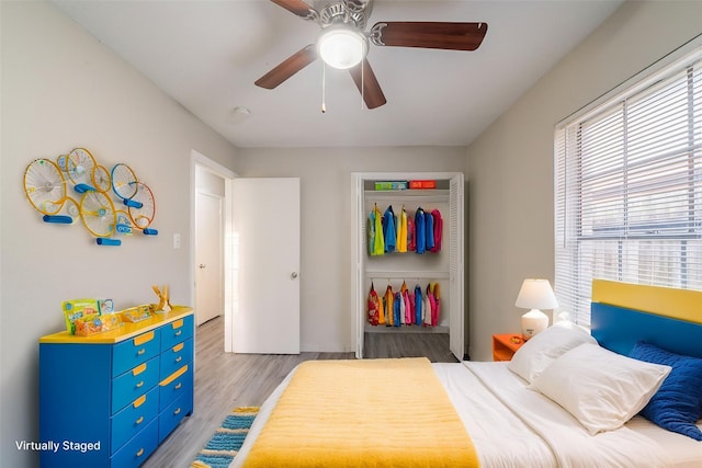 751 Terryhollow St, Channelview, TX 77530 - bedroom featuring a closet, light wood-style floors, and ceiling fan