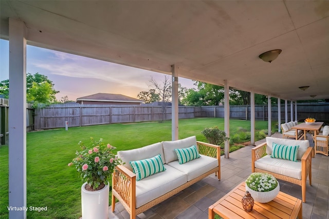 751 Terryhollow St, Channelview, TX 77530 - patio terrace at dusk featuring an outdoor hangout area