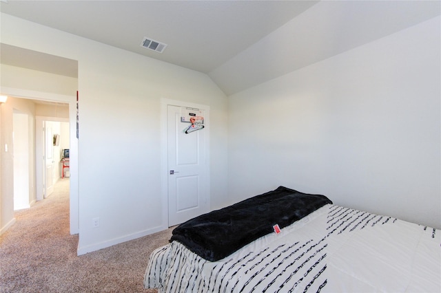 3033 Myrtle Sunset Dr, Katy, TX 77493 - carpeted bedroom featuring baseboards and vaulted ceiling