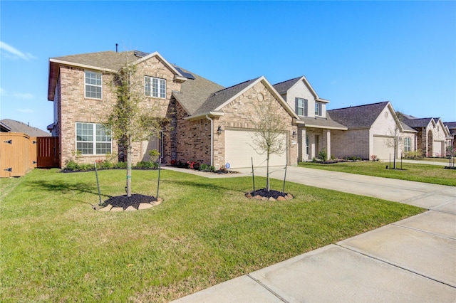 3033 Myrtle Sunset Dr, Katy, TX 77493 - traditional-style house with driveway, a garage, brick siding, roof with shingles, and stone siding