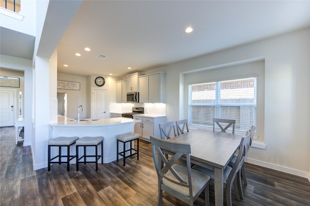 3033 Myrtle Sunset Dr, Katy, TX 77493 - dining space featuring dark wood finished floors, recessed lighting, and baseboards