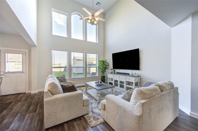 3033 Myrtle Sunset Dr, Katy, TX 77493 - living area featuring high vaulted ceiling, dark wood-type flooring, a ceiling fan, and baseboards